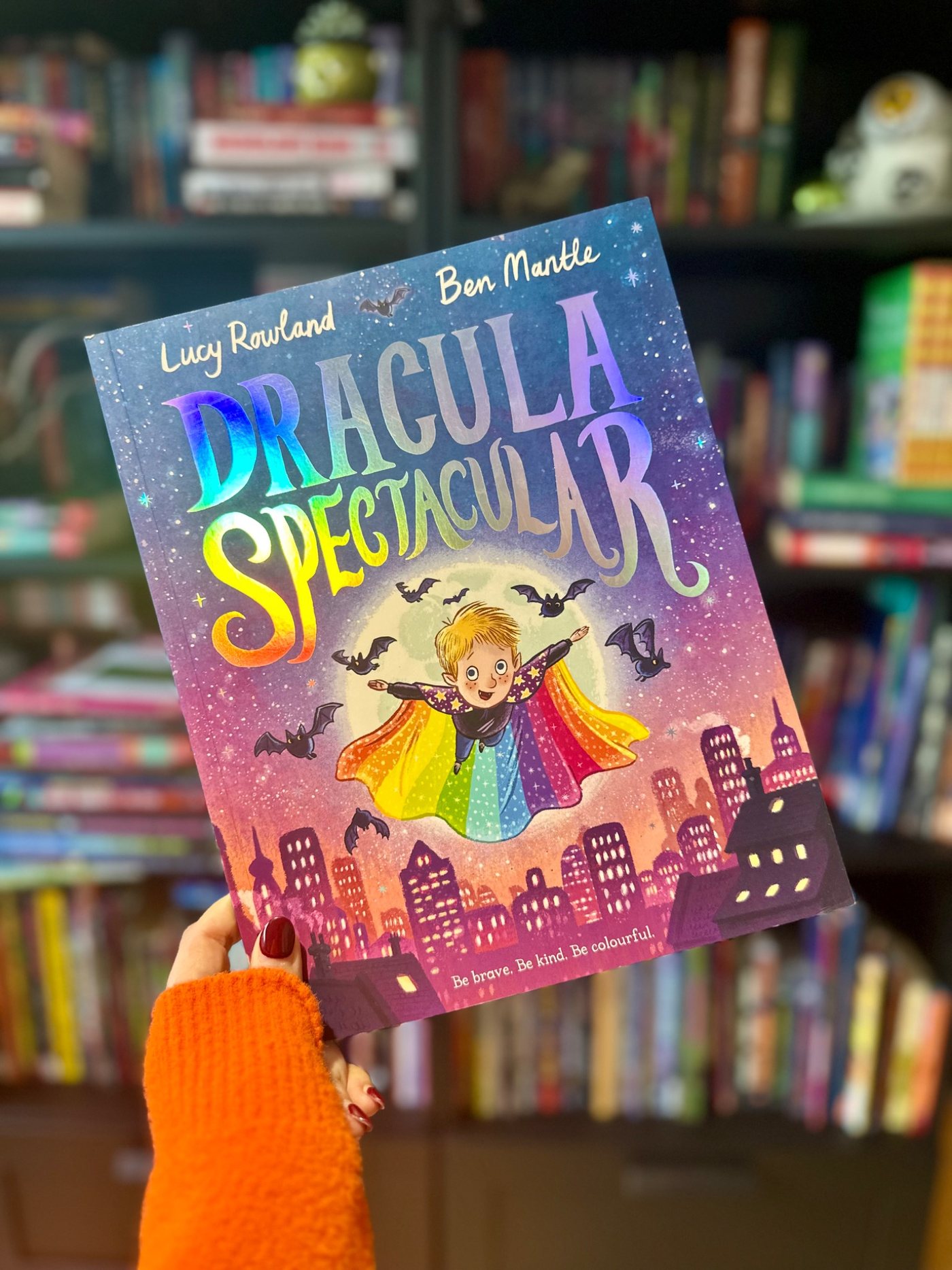 October Jones holding Dracula Spectacular