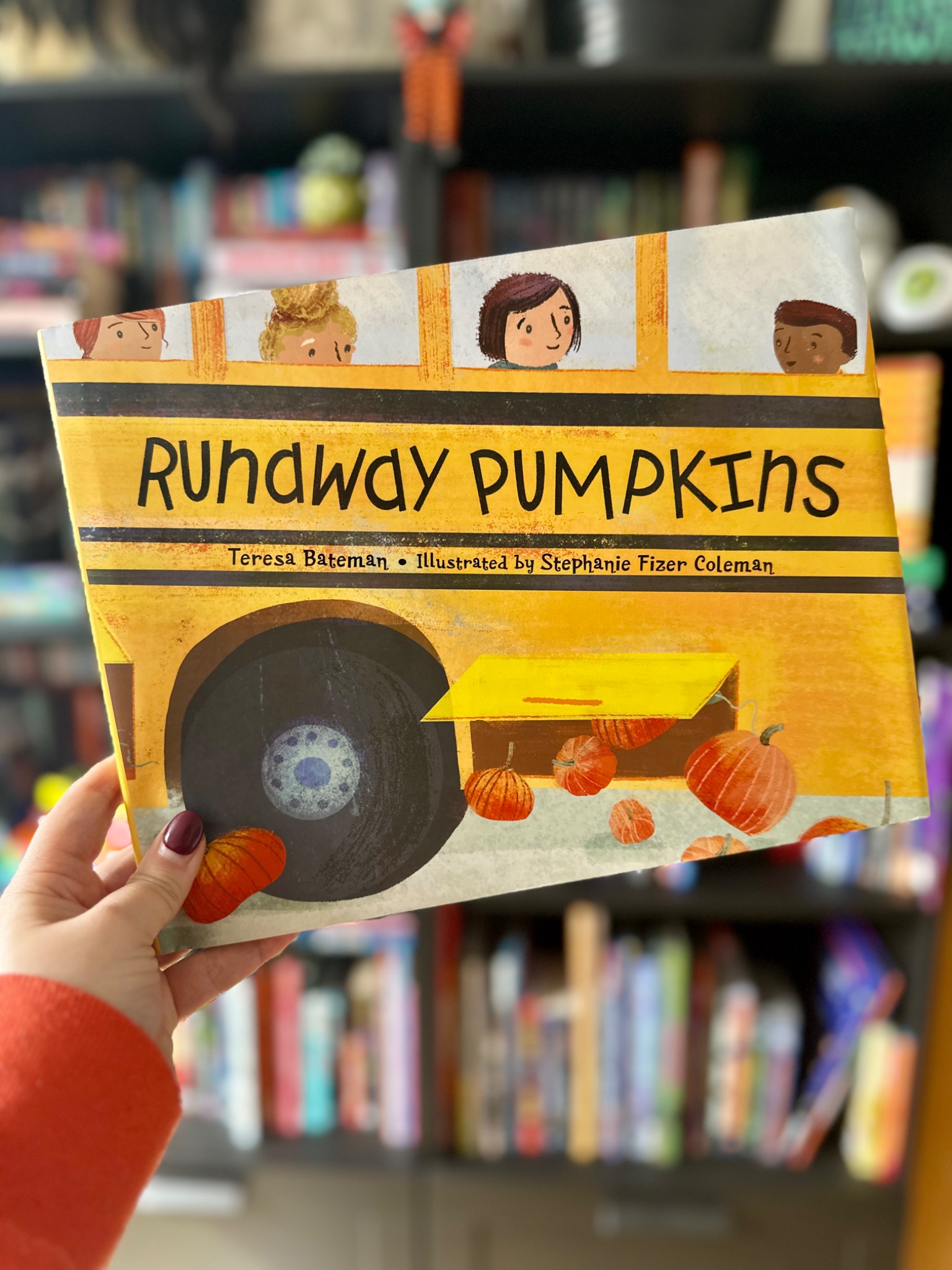 October Jones holding Runaway Pumpkins